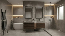 Load image into Gallery viewer, Modern bathroom interior with a double-sink vanity, two rectangular mirrors, a freestanding bathtub, glass shower enclosure, and gray stone walls and floor.